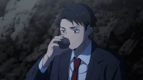 a man in a suit and tie is looking up