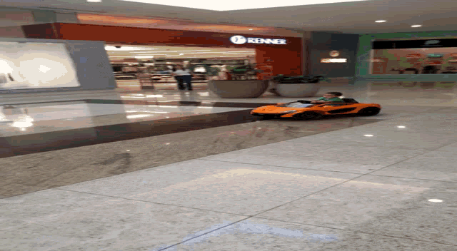 a store in a mall with a sign that says reinker