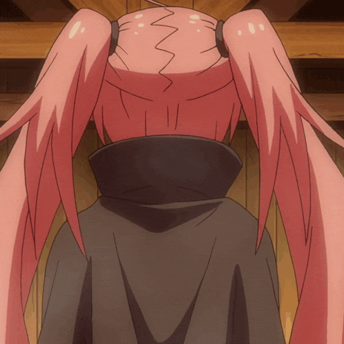 a girl with pink hair and a black cape