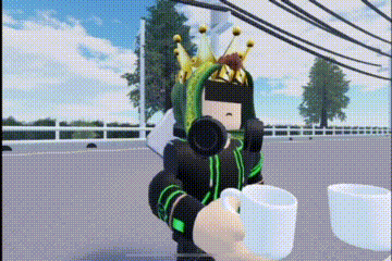 a person in a video game is holding a white cup .