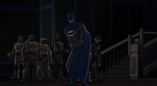 a group of teenage mutant ninja turtles and batman are standing together