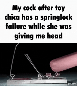 a picture of a mousetrap with a pink sausage sticking out of it