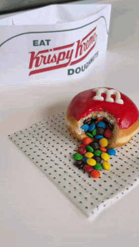 a krispy kreme doughnut with m & m 's on it
