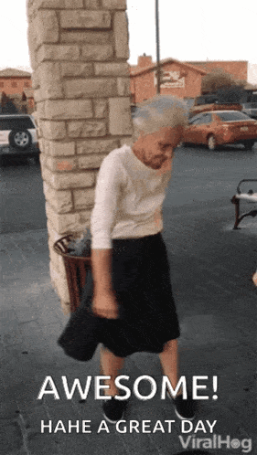 an elderly woman is dancing in front of a brick wall with the words awesome on the bottom