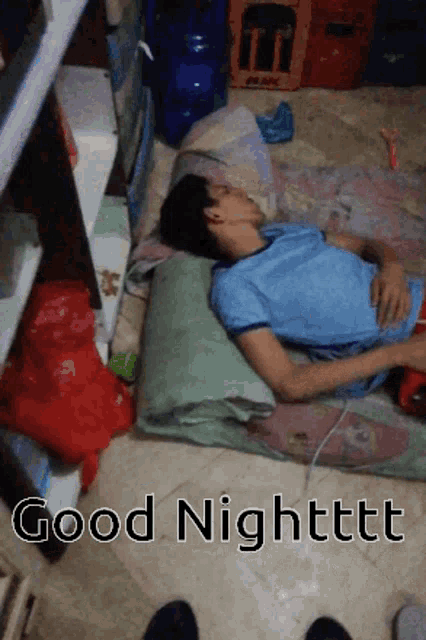 a man is laying on a pillow with the words good night written on the bottom
