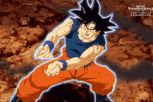 a cartoon of a man in a blue shirt and orange pants standing in a karate pose .