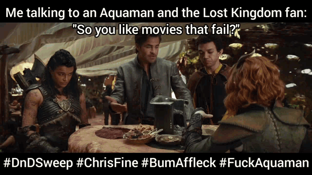a group of people sitting around a table with the caption " so you like movies that fail "