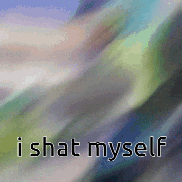 a blurred image with the words " i shat myself " on it