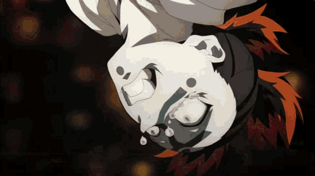 a close up of a cartoon character 's face with tears coming out of it