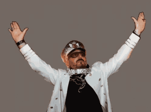a man with his arms in the air is wearing a white jacket with the word gigi on it