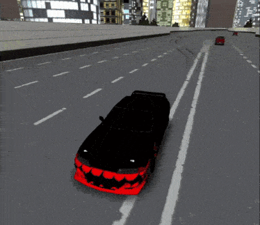 a black car with red flames painted on the front is driving down a highway