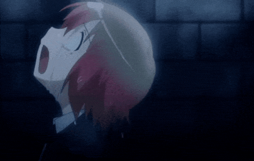 a girl with red hair is standing in front of a brick wall with her mouth open .