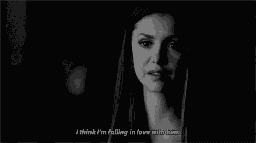 a woman says i think i 'm falling in love with him in a black and white photo