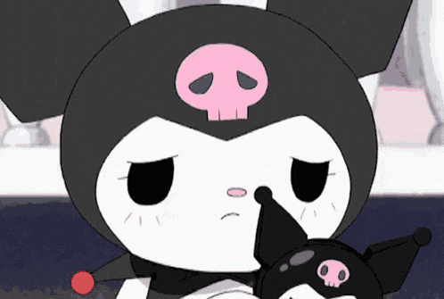 a close up of a cartoon character with a skull on his head and a pink nose .