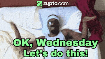 a man is laying on a bed with the words " ok wednesday let 's do this "