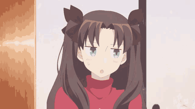 a girl with long dark hair and blue eyes is wearing a red turtleneck sweater