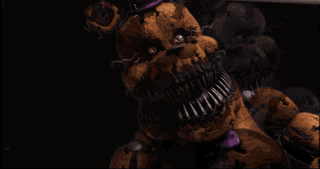 a teddy bear with a purple bow tie on it