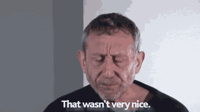 a man with his eyes closed and the words that wasn 't very nice behind him