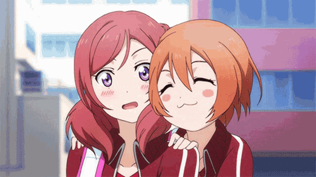 a couple of anime girls are hugging each other