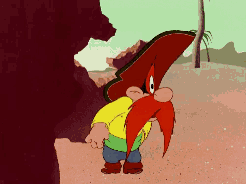 a cartoon character with a beard wearing a sombrero and a yellow shirt