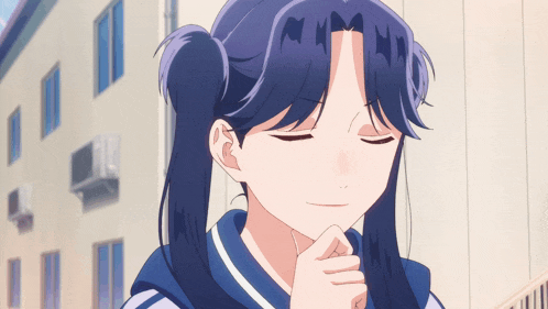a girl with blue hair has the letter m on her face