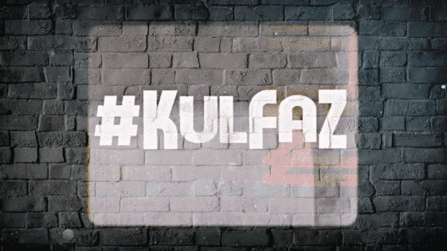 a brick wall has #kulfaz written on it in white