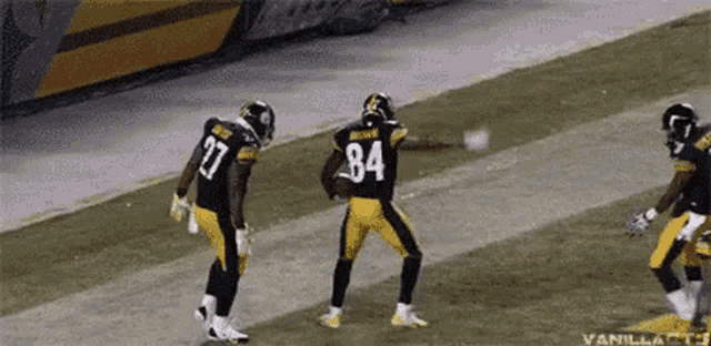 a football player with the number 84 on his jersey