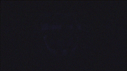 a white light is shining on a purple background