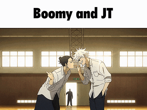 boomy and jt are standing next to each other in a gym