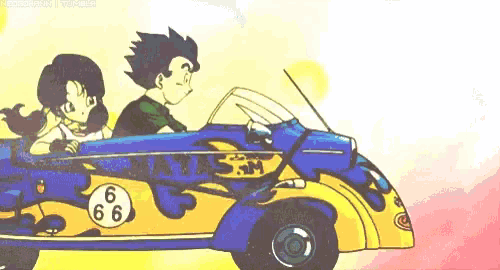 a boy and a girl are sitting in a blue and yellow car .