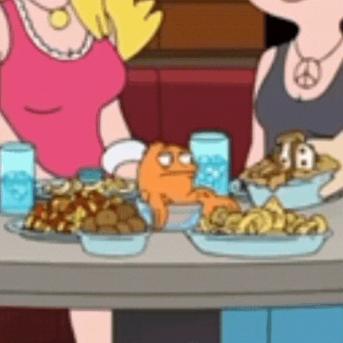 a couple of cartoon characters are sitting at a table with plates of food and drinks .