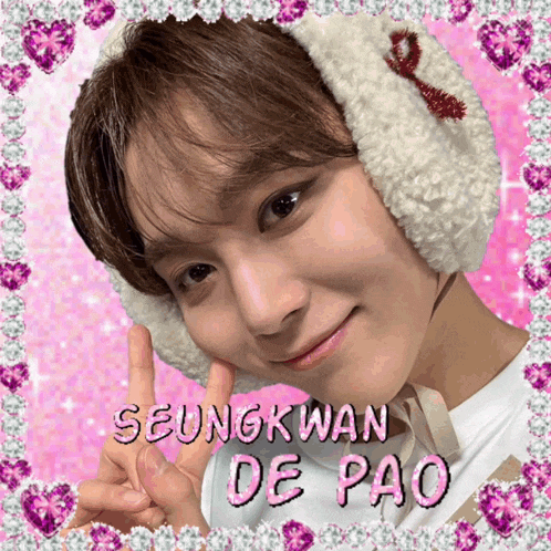 a picture of seungkwan de pao is surrounded by hearts