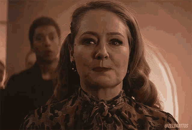a close up of a woman 's face with the hashtag zeldaritos on the bottom right