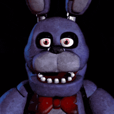 a close up of bonnie from five nights at freddy 's with a red bow tie