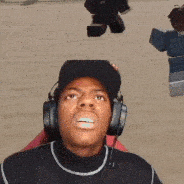 a man wearing headphones is making a funny face with his eyes closed