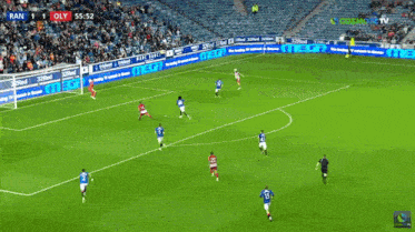 a soccer game is being played in front of a crowd with a banner that says iron bears