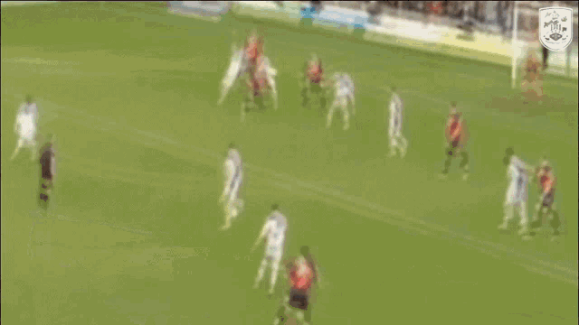 a blurry picture of a soccer game with a watermark that says ' soccer '