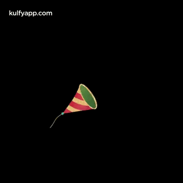 a colorful party horn with confetti coming out of it on a black background .