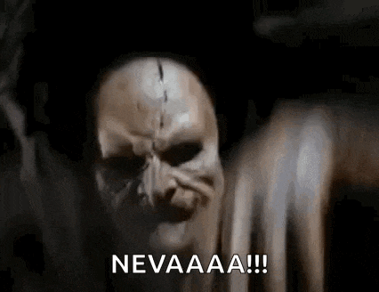 a close up of a scary face with the words `` nevaaa !!! '' written on it .