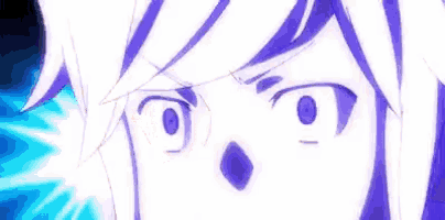 a close up of a person 's face with a shocked look on his face .
