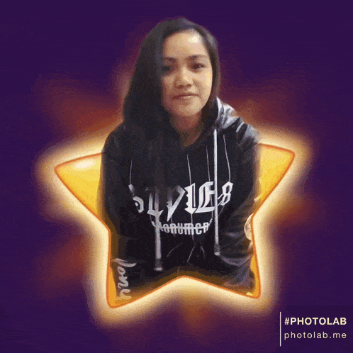a girl wearing a black hoodie with the word style on the front