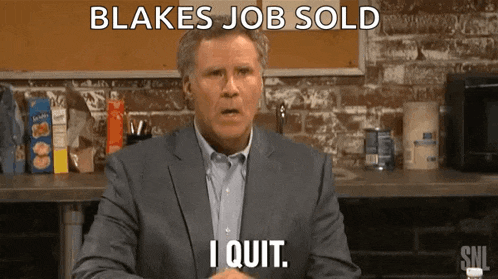 a man in a suit says " blakes job sold i quit " while sitting in a kitchen
