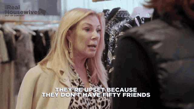 a woman talking to another woman with the words they 're upset because they don 't have fifty friends visible