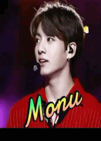 a young man wearing a red shirt with the word moniu written on it