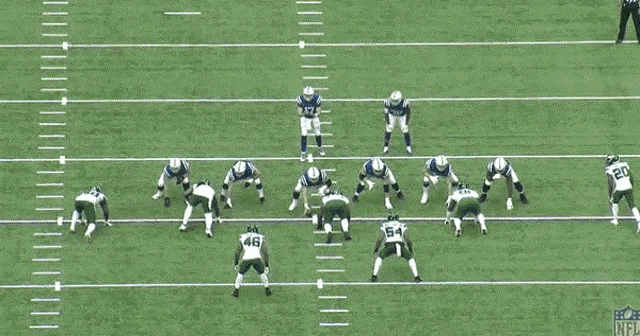 a football game is being played on a field with the nfl logo visible
