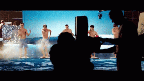 Louis Tomlinson Kiss You GIF - Surfing Louis Tomlinson Dancing GIFs