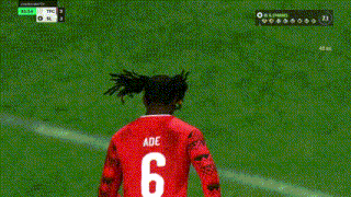 a soccer player in a red jersey with the number 6 on it