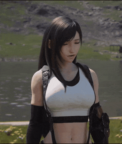 a woman in a crop top with the letter a on the front