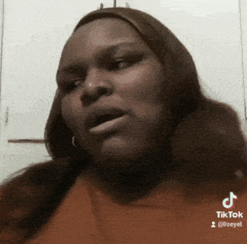 a woman 's face is visible in a tik tok video