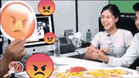 a woman wearing a t-shirt that says you can do it sits at a desk